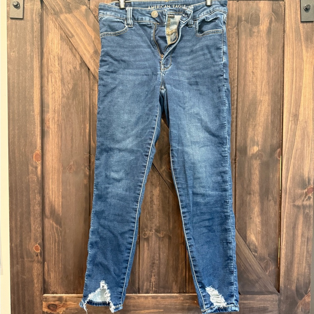 American Eagle Outfitters Blue Skinny Jeans with Distressed Hem